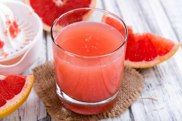 Грейпфрут и сок из него Фото